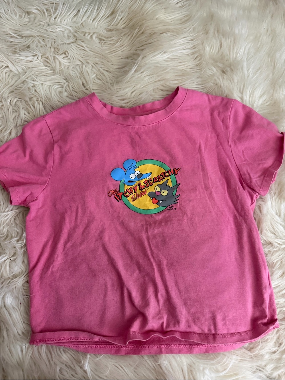 Pink Graphic Crop Tee Featuring Cartoon Logo